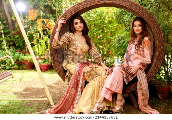 Female\
beautiful models asian pakistani indian Posing for shoot \
In a\
park garden wearing asian pakistani indian dress shalwar\
kameez\
Karachi Sindh Pakistan\
October\
2019