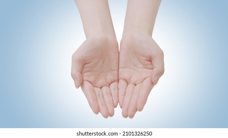 Female Beauty Hands Showing Palms Top View In Giving Or Receiving Gesture. Isolated Clean Background Showing Holding Or Offering Pose Revealing Product Showcase And Copy Space. Young Woman White Skin.