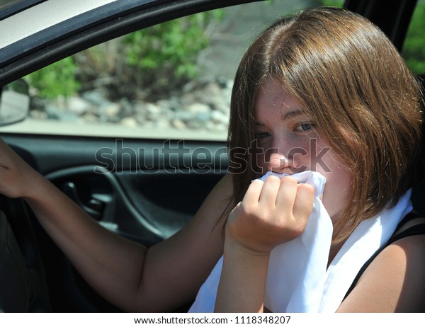 Female beauty test\
driving her new car.