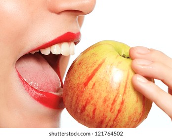 Female biting an apple