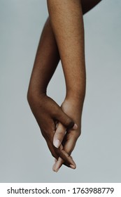 Female Black And Brown Hands Entwined. Women Of Color Holding Hands Showing Friendship And Support. People Of Color, Hand In Hand, Diversity, Freedom, Anti Racism Concept