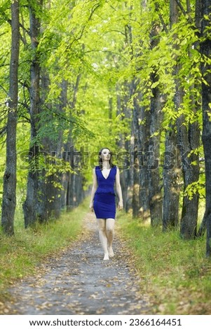 Similar – Foto Bild Rot gekleidete Frau, die im Wald meditiert.