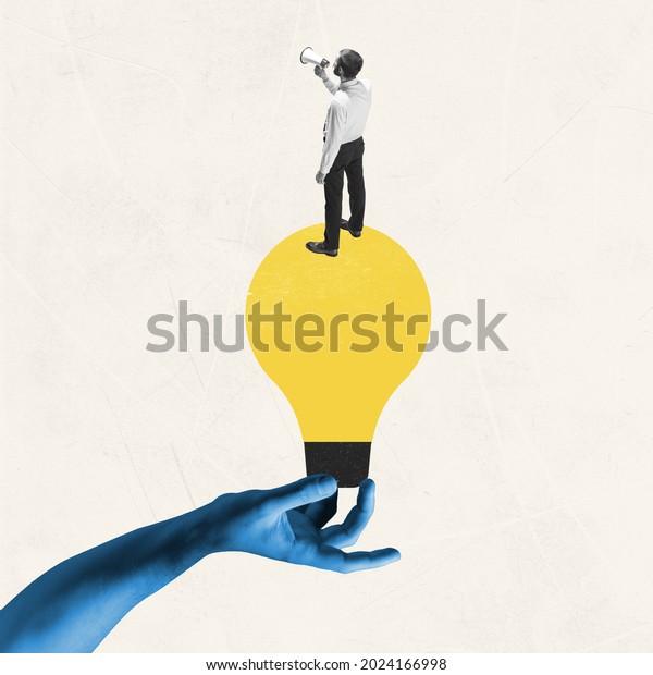 Female blue hand holding yellow bulb as idea symbol\
with young man, office worker isolated on light background.\
Contemporary art collage. Inspiration, idea. Concept of occupation,\
business, ad.