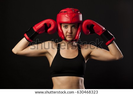 Female boxer, super woman concept on blcka background