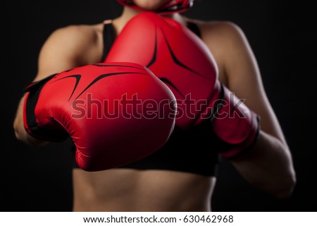 female boxer warming up before boxing match