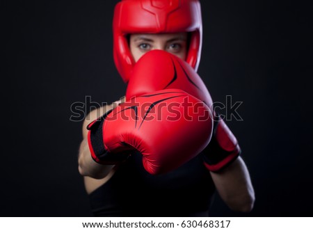 female boxer warming up before boxing match