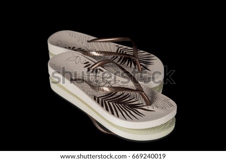 Female Brown Slipper on Black Background, Isolated Product, Top View, Studio.