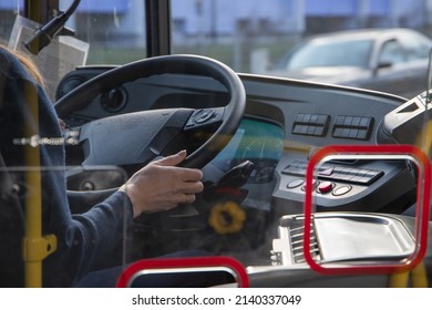 The Female Bus Driver Is Driving. 