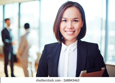 Female Business Leader Looking At Camera