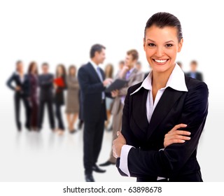 Female Business Leader Standing In Front Of Her Team