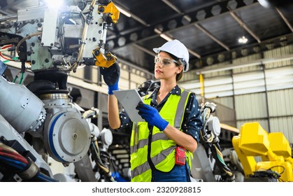 Female business owner engineer managing and checking work at factory - Powered by Shutterstock