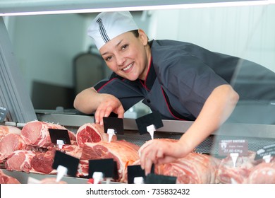 Female Butcher Posing And Smiling