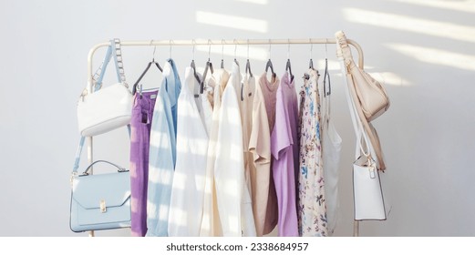 female  capsule summer wardrobe in  white room - Powered by Shutterstock