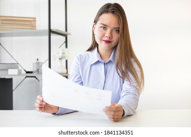 Female career. Project management. Professional success. Confident ambitious smart woman with paper work at light home office on white copy space background. - Shutterstock ID 1841134351