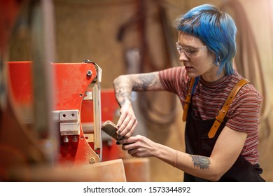 Female Carpenter In Her Workshop