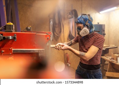 Female Carpenter In Her Workshop