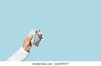 Female Caucasian Doctor Nurse Hand With Pills Or Prescription Drugs. Medicine And Pharmacy. General Practitioner Or Pcp Family Doctor Appointment. Medical Concept. Pharmacy. Banner Copy Space