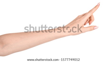 Female caucasian hands  isolated white background showing  gesture points finger to something or someone.  woman hands showing different gestures