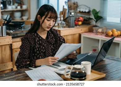 A Female Is Checking Her Papers For The Midterm Exam, Practice More And More Before Present To The Professor. Work From Home Concept.