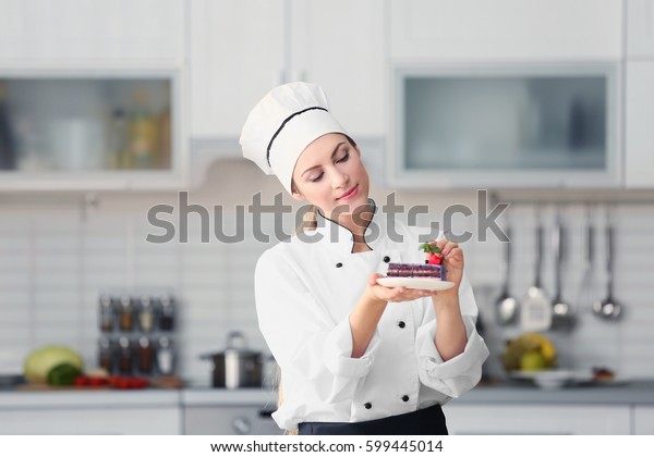 Female Chef Decorating Cake Kitchen Stock Photo Edit Now 599445014