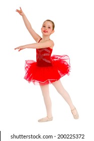 A Female Child Ballet Dancer In Red Tutu Recital Costume