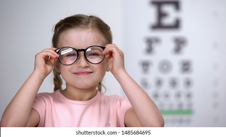 Female Child With Poor Eyesight Happy To Wear Comfortable Eyeglasses, Smile