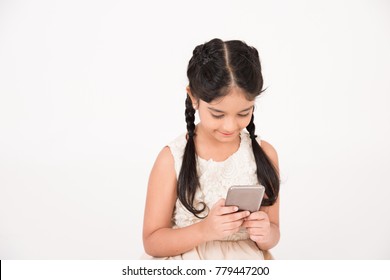 Female Child Using Smart Phone On White Background