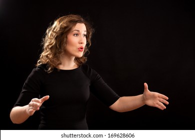 Female Choir Conductor During Performance