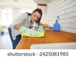 Female cleaner kitchen cloth polishing, happy housewife, professional janitor service busy cleaning home, office. Smiling woman taking care of room, maintaining washing, dusting, mopping, washing 