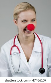 Female Clown Doctor With Red Nose