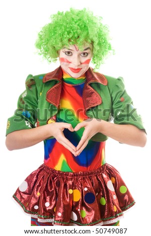 Female clown makes the heart with his hands
