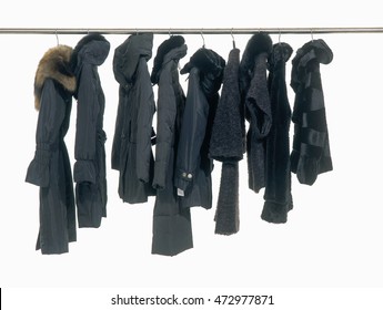 Female Coat Clothing Hanging On Hangers