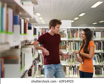 Female College Student Giving Phone Number To Her Mate. Horizontal Shape, Side View, Copy Space