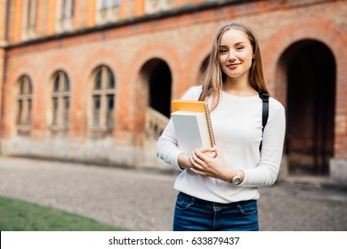 Female College Student. Happy Girl In European University For Scholarship. Uni