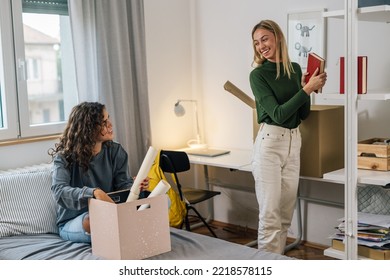 Female College Student Move In Dorm. They Are Talking In The Room