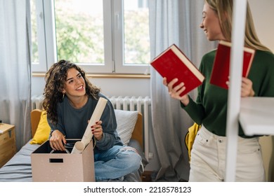 Female College Student Move In Dorm. They Are Talking In The Room