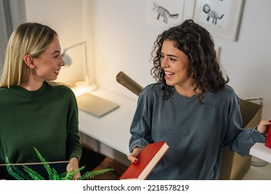 Female College Student Move In Dorm. They Are Talking In The Room