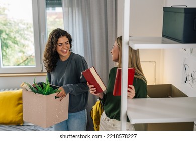 Female College Student Move In Dorm. They Are Talking In The Room