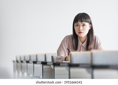 Female College Student Taking Class