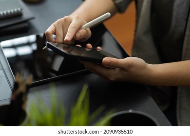 A Female College Student Using Smartphone To Order Food Delivery Service Via Mobile Application.