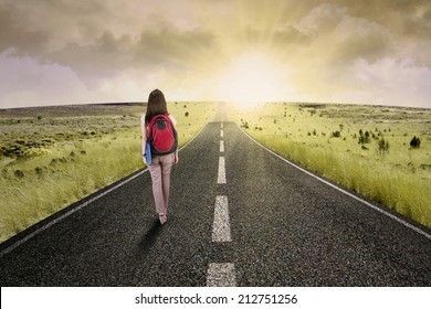 Female College Student Walk On The Road To Start Her Journey And Gain Bright Future