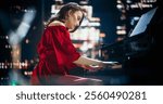 Female Composer Pours Her Soul Into the Grand Piano, Filling the City Venue With Expressive Notes. Stage Lights Create a Serene Atmosphere, Enhancing the Emotional Depth of Her Classical Performance