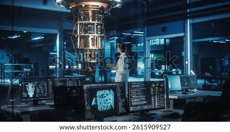 Female Computer Scientist Developing Quantum Machine Learning Algorithms, Using a Tablet Computer to Simulate and Test Their Performance. She is Standing in an Advanced Dark Office Alone