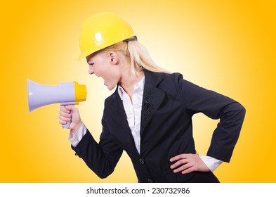 Female Construction Worker With Loudspeaker