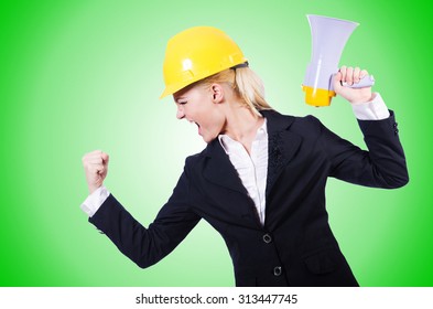 Female Construction Worker With Loudspeaker