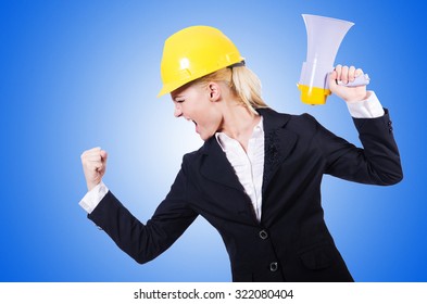 Female Construction Worker With Loudspeaker