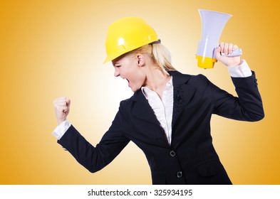 Female Construction Worker With Loudspeaker