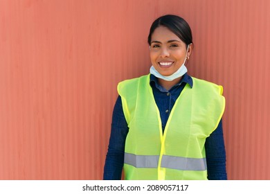 Female Construction Worker Wearing A Protective Mask