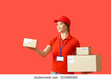 Female Courier With Parcels On Color Background