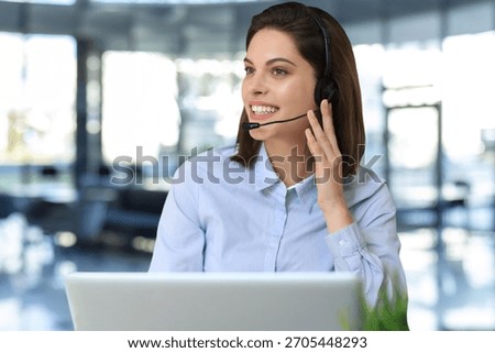 Female customer support operator with headset and smiling